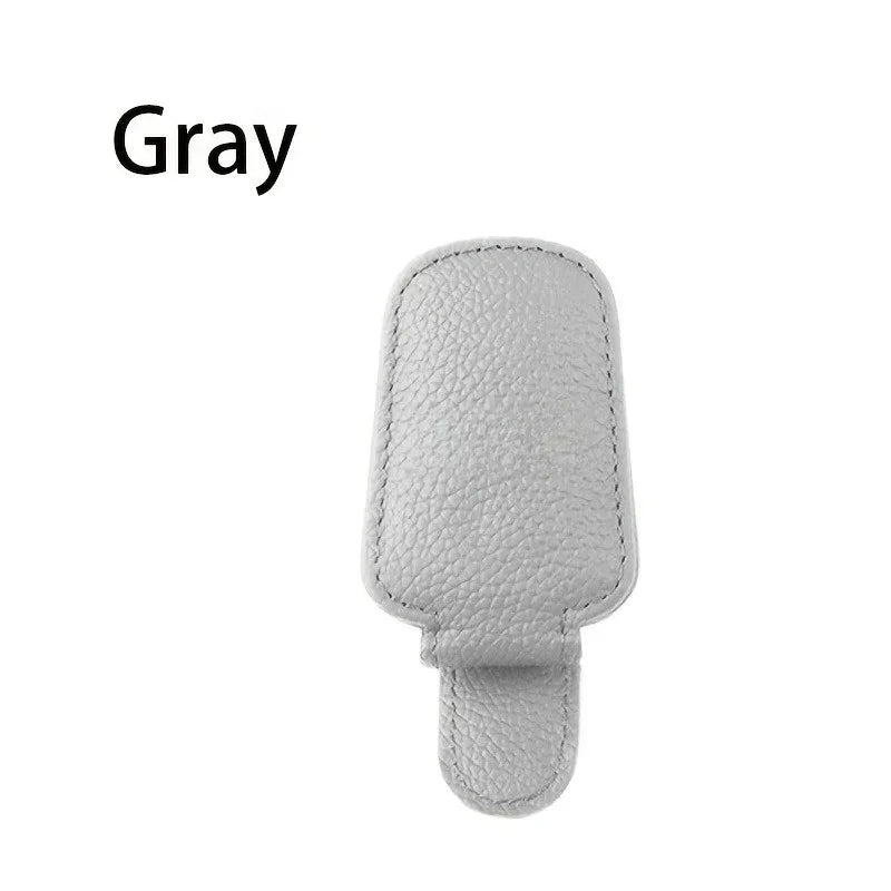 Akinių laikiklis automobiliui, odinis